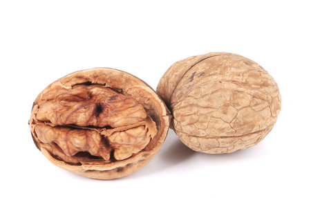 Crushed walnuts on white. isolated on a white 