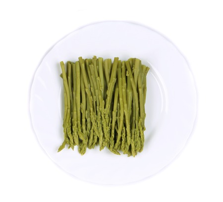 Canned asparagus on plate. Isolated on a white background.の写真素材