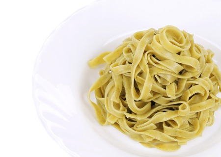 Pasta on the plate. Isolated on white background.の写真素材
