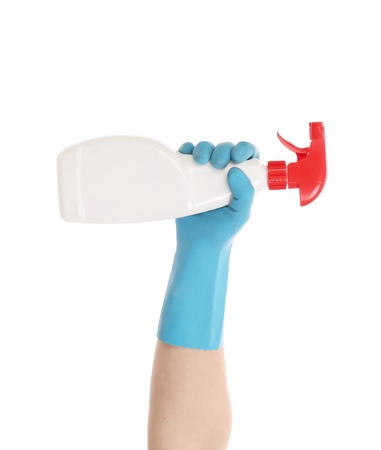 White plastic dispencer in hand. Isolated on a white background.の写真素材