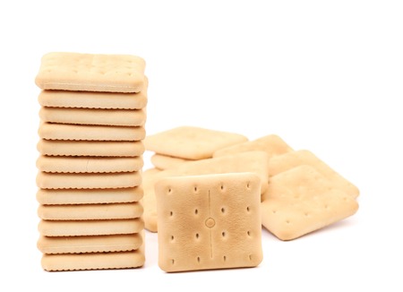 Stack saltine soda cracker. Isolated on a white の写真素材