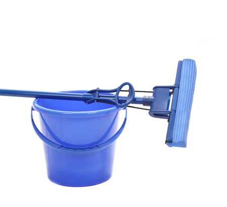 Blue bucket with sponge mop. Isolated on a white background.の写真素材