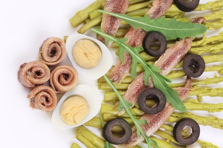 Salad with anchovies and asparagus.の写真素材