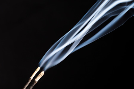 Abstract blue smoke. Black background.の写真素材