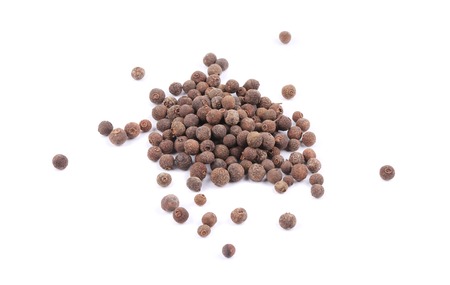 Black peppercorn. Isolated on a white background.の写真素材