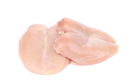 Raw chicken fillets. Isolated on a white background.の写真素材