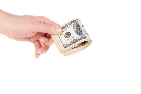 Dollar banknotes in hand. Isolated on a white background.