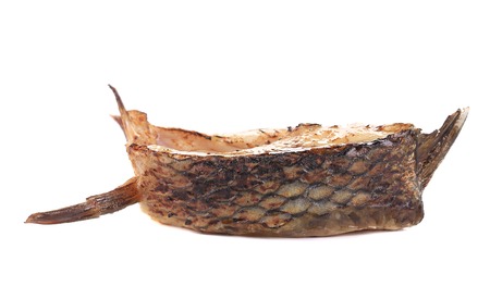 Piece of fried carp. Isolated on white background.の写真素材