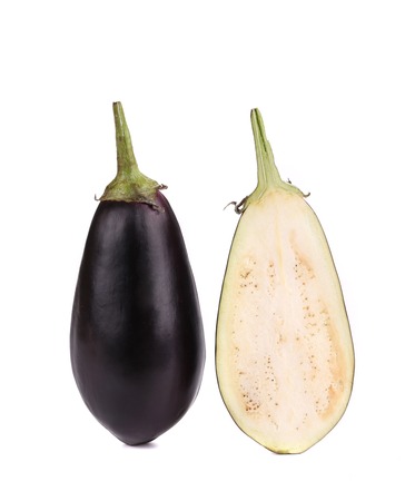 One halved eggplant. Isolated on a white background.の写真素材