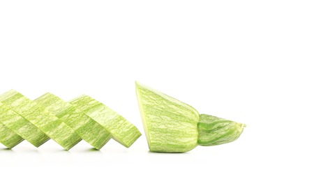 Fresh sliced marrow. Isolated on a white background.の写真素材