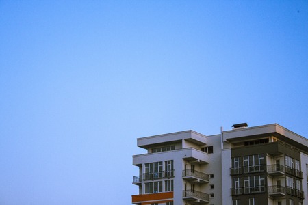 Top of new devoid of inhabitants building and blue sky. There is space for text.の写真素材
