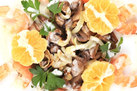 Shrimp salad with mushrooms and white sauce. Isolated on a white background.の写真素材