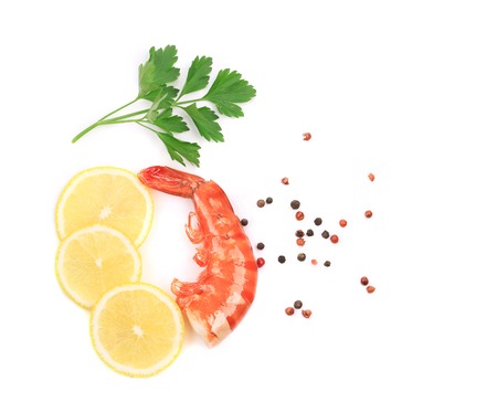 Shrimp with lemon and parsley. Isolated on a white background.の写真素材