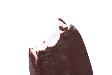 Bitten ice cream on stick. Isolated on a white background.の写真素材