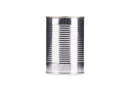 Close up of closed tin can. Isolated on a white background.の写真素材