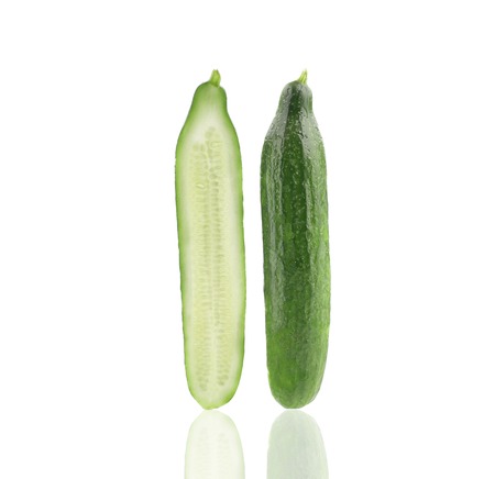 Two slices of cucumber. Isolated on a white background.の写真素材