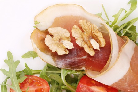 Salad with arugula and prosciutto. Macro. Whole background.の写真素材