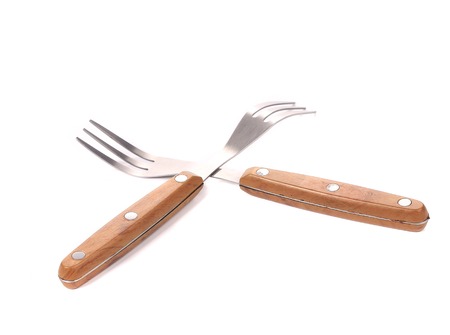 Two wooden handle forks. Isolated on a white background.の写真素材