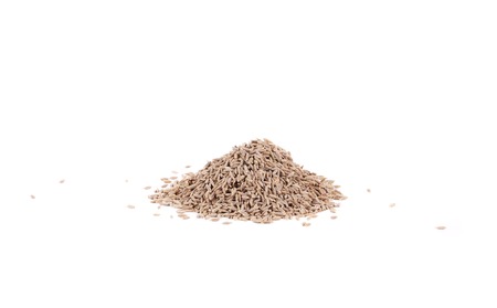 Pile of cumin seeds captured from side. Isolated on a white background.の写真素材