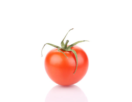 Close up of fresh tomato. Isolated on a white background.