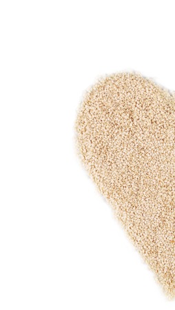 Half of heart shape from sesame seeds. の写真素材