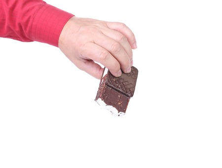 Hand holds sandwich ice cream. の写真素材