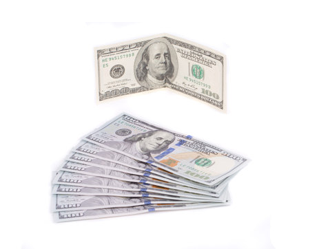 Hundred dollar bills. Isolated on a white background.