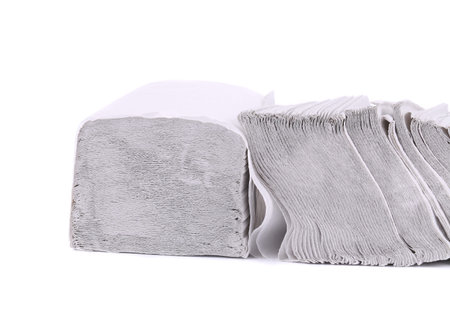 Stack of disposable papers. Isolated on a white background.