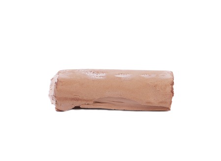 Roll of chocolate ice cream. Isolated on a white background.の写真素材