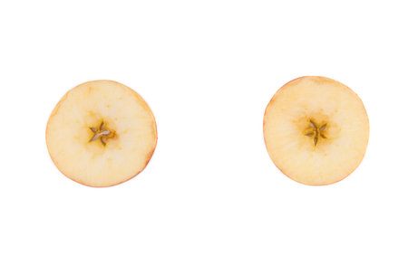 Close up of sliced apple. Isolated on a white background.の写真素材