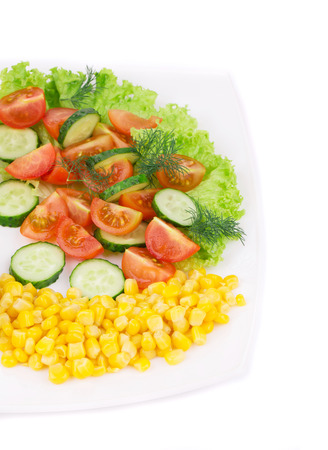 Salad with corn and vegetables. Whole background.の写真素材