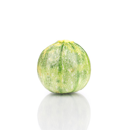 Courgette or zucchini. Isolated on a white background.の写真素材