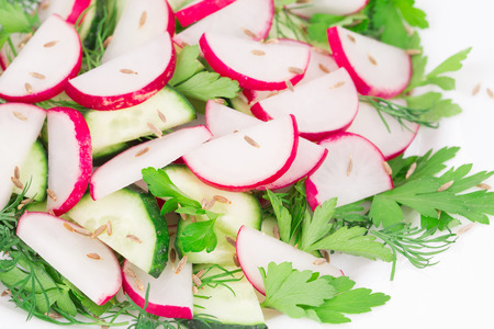 Radish salad with cucumber. Close up. Whole background.の写真素材