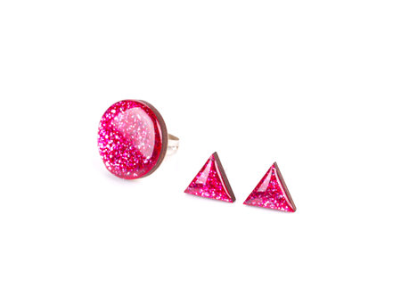 Ring and earrings with stones set. Isolated on a white background.