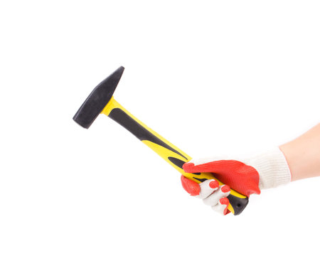 Man hand holding hammer. Isolated on a white background.