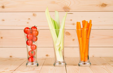 Fresh vegetables juices in glasses. Whole background.の写真素材
