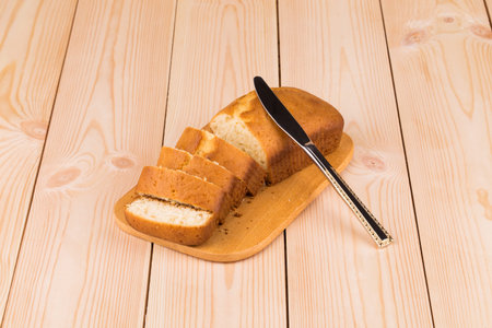 Fresh cake slices on board. Whole background.