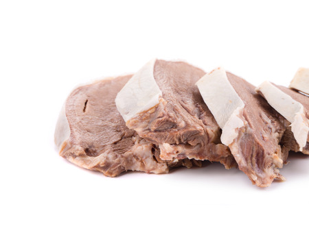 Sliced beef tongue. Isolated on a white background.の写真素材
