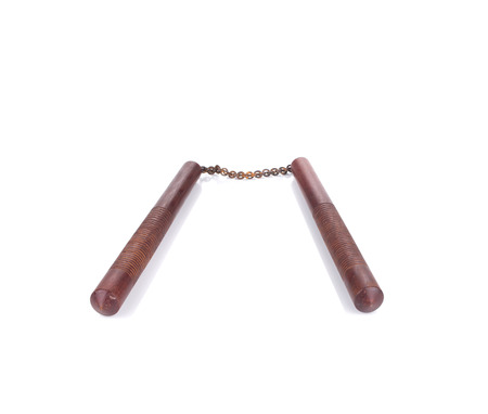 Wooden nunchaku weapon. Isolated on a white background.の写真素材