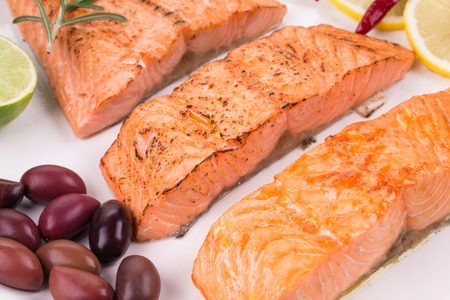 Grilled salmon on white plate close upの写真素材