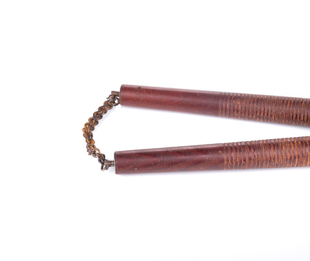 Martial arts nunchaku weapon. Isolated on a white background.の写真素材