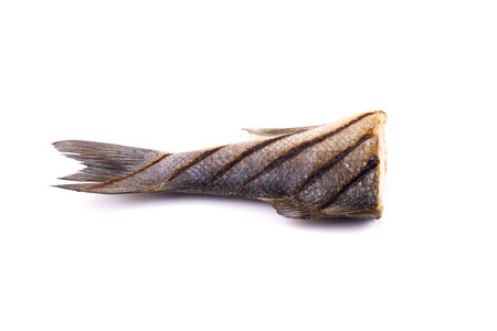 Grilled fish. Isolated on a white background.の写真素材