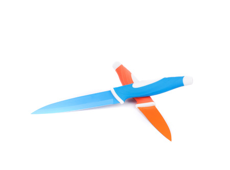 kitchen knives on white background in closeupの写真素材