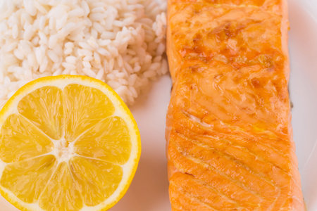 Roasted salmon fillets with rice. Whole background.の写真素材