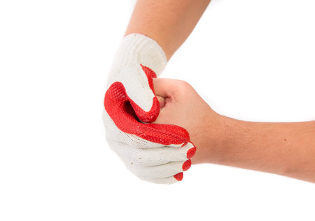 Worker hand glove clenching fist. Isolated on a white background.の写真素材