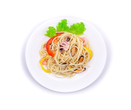 Tasty italian pasta with seafood. Isolated on a white background.の写真素材