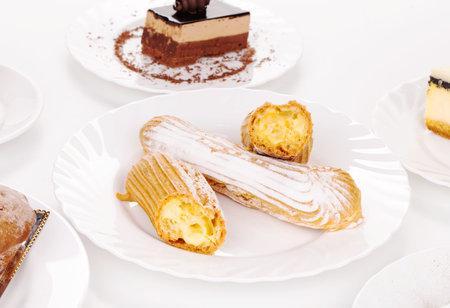 Tasteful Eclairs isolated on white background closeup