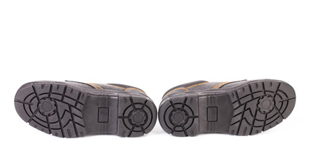 soles of grey shoes photographed from belowの写真素材