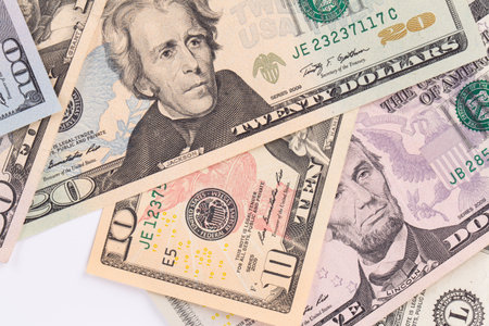 Close up of different dollar bills. Isolated as a background.