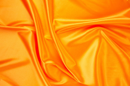 Orange silk texture as a background. Whole background.の写真素材